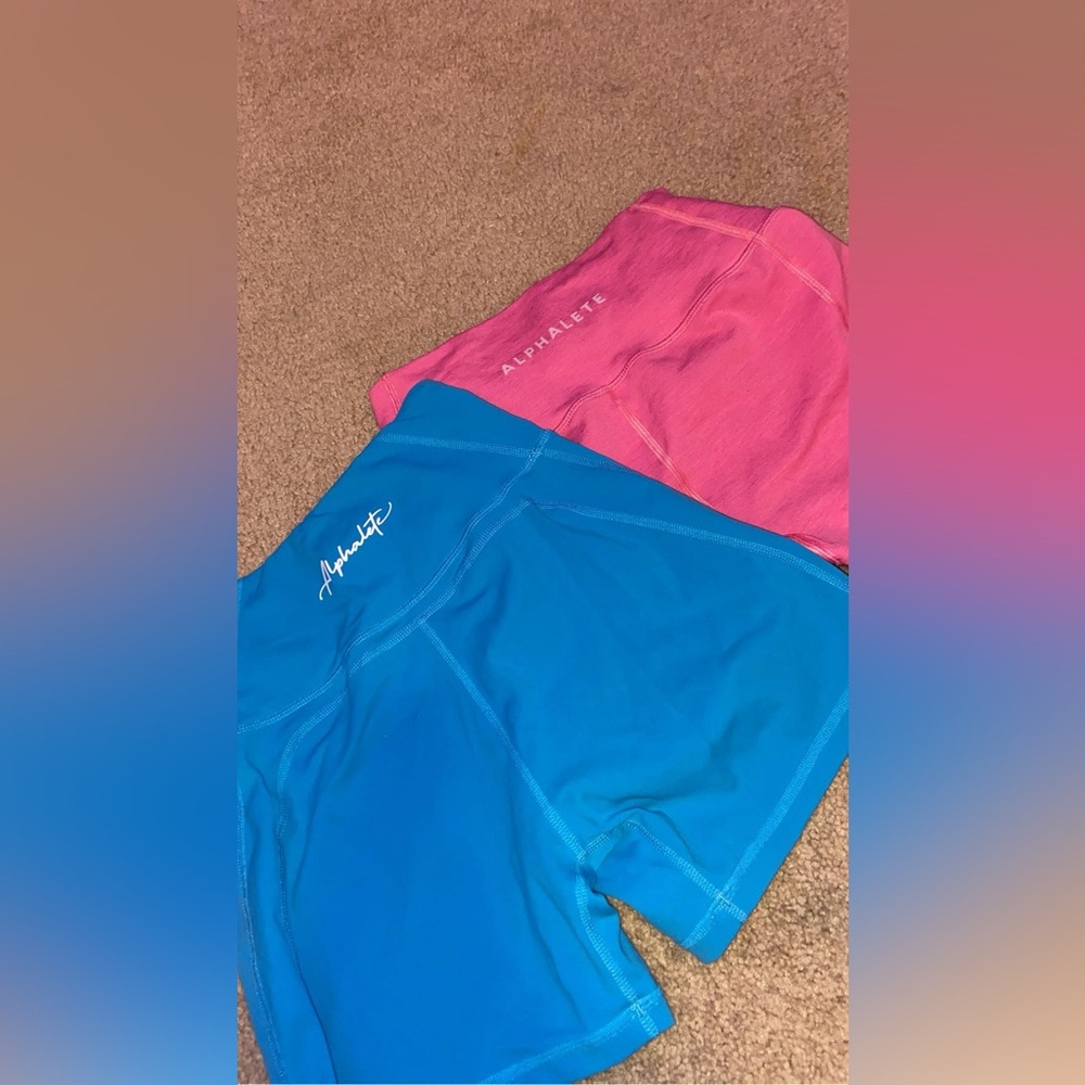 Set of blue and pink ALPHALETE biker shorts